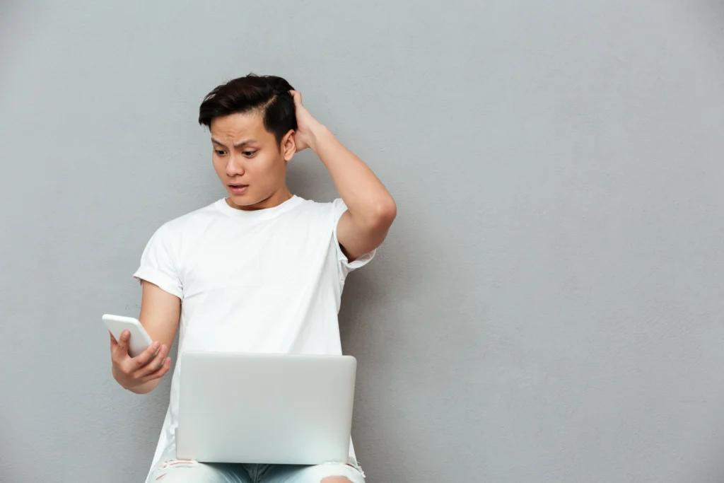 confused man with phone
